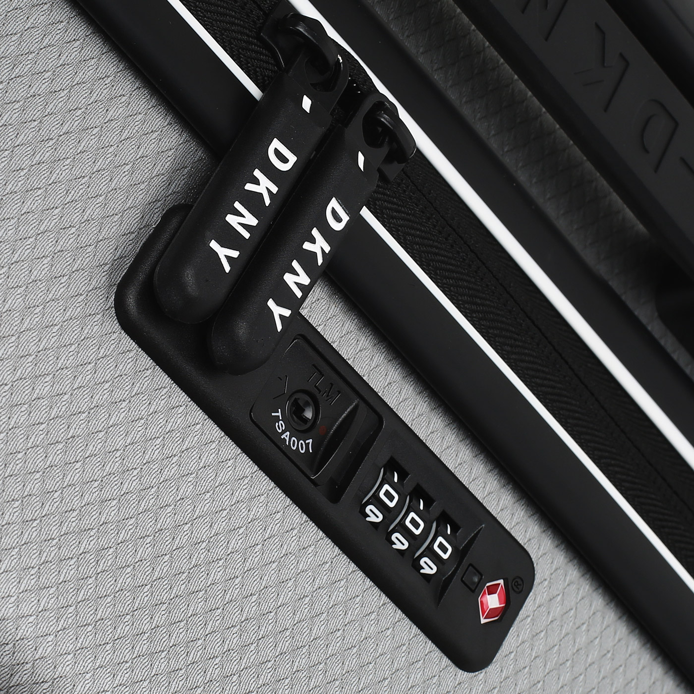 Чемодан средний M из ABS-пластика с кодовым замком DKNY DKNY-300 Dash